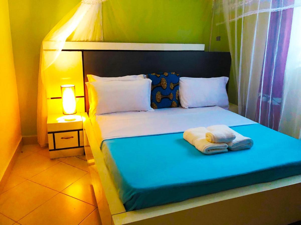 Airport Unique Hotel Entebbe Bagian luar foto