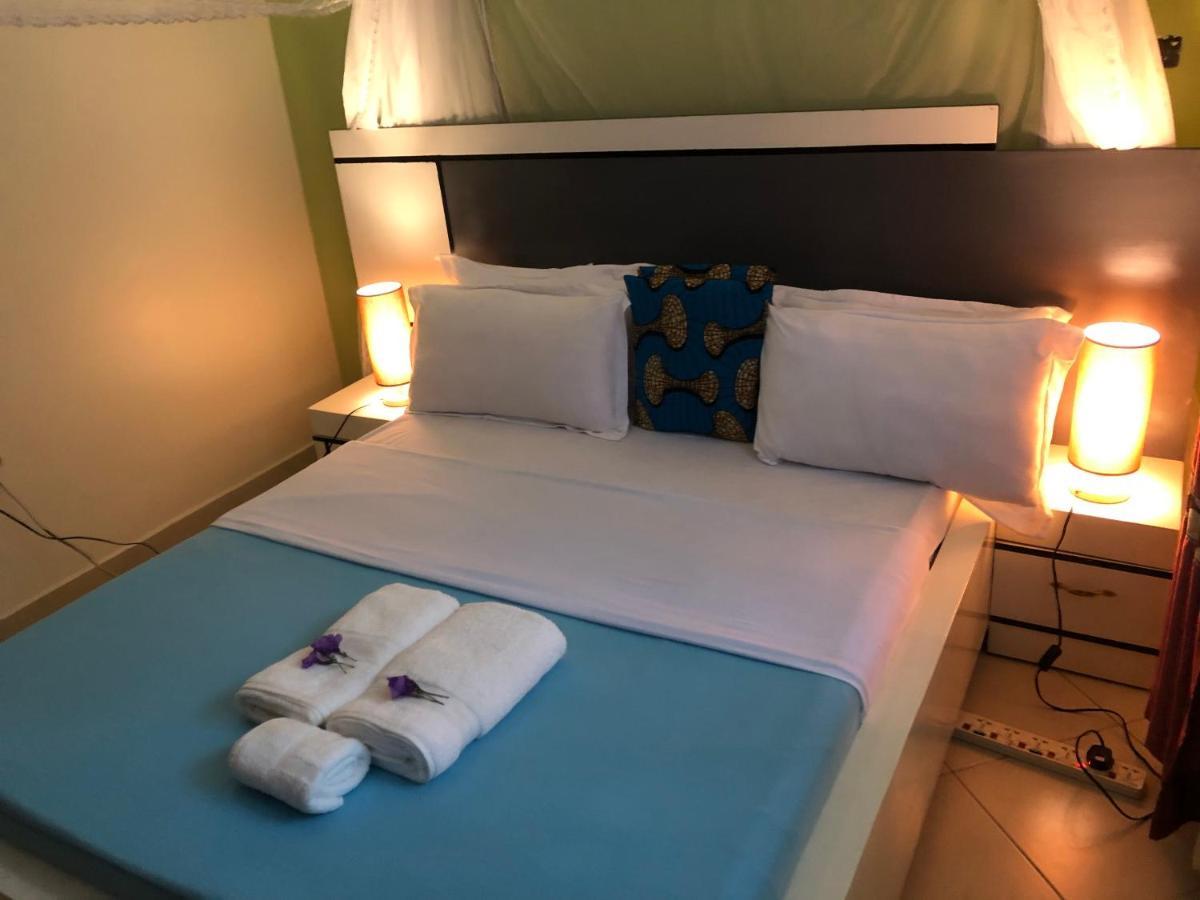 Airport Unique Hotel Entebbe Bagian luar foto