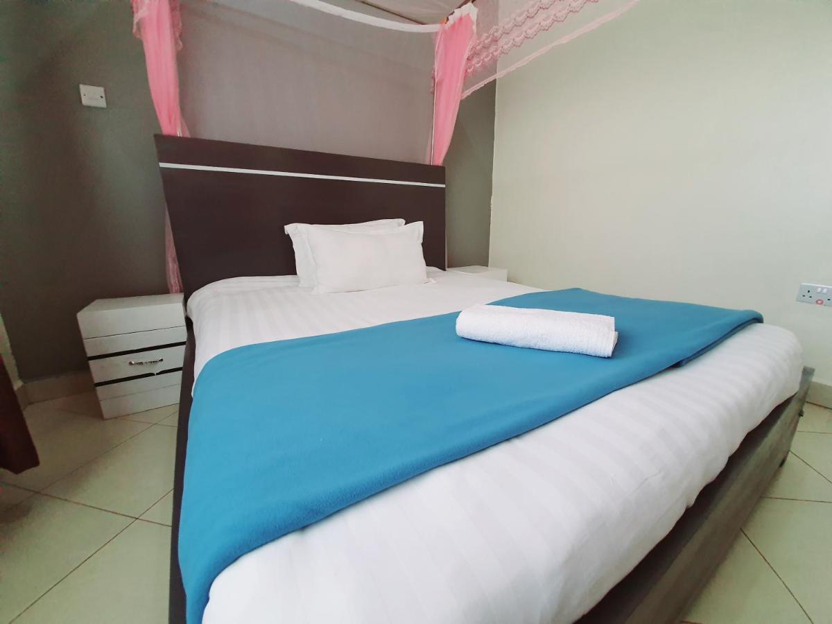 Airport Unique Hotel Entebbe Bagian luar foto