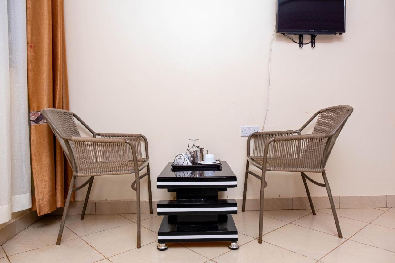 Airport Unique Hotel Entebbe Bagian luar foto
