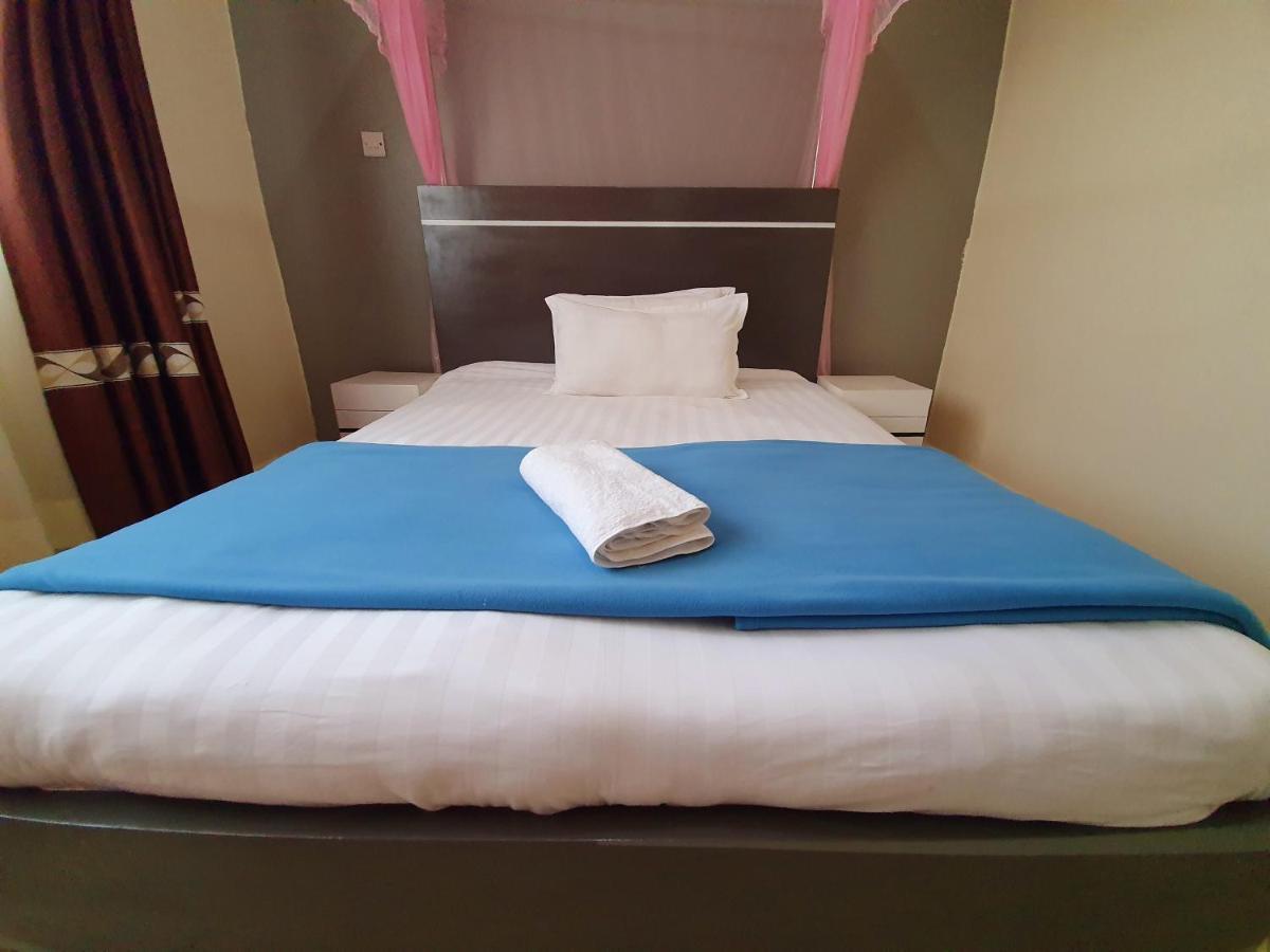 Airport Unique Hotel Entebbe Bagian luar foto