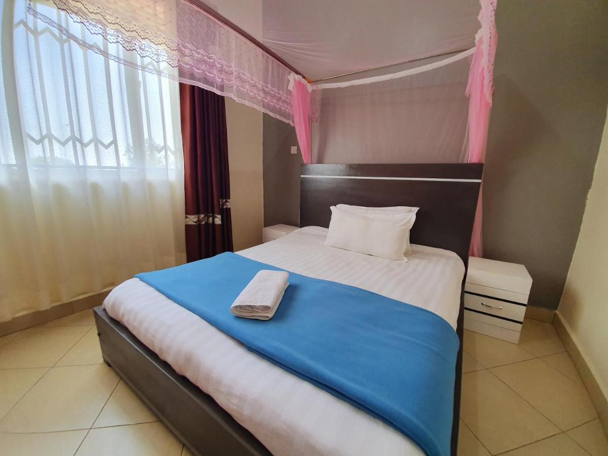 Airport Unique Hotel Entebbe Bagian luar foto