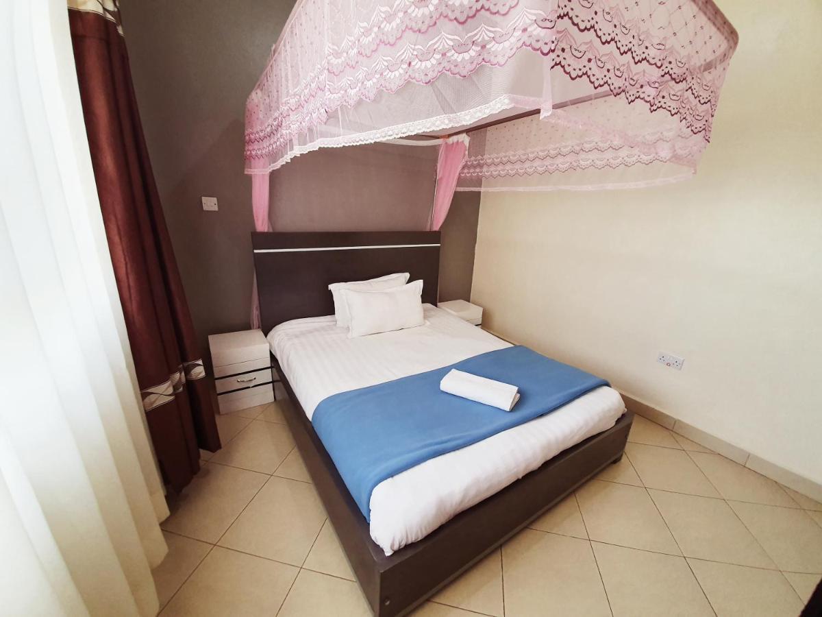 Airport Unique Hotel Entebbe Bagian luar foto